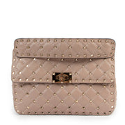 Valentino Garavani Beige Rockstud Spike Top Handle for the best price at Labellov secondhand luxury in Antwerp.