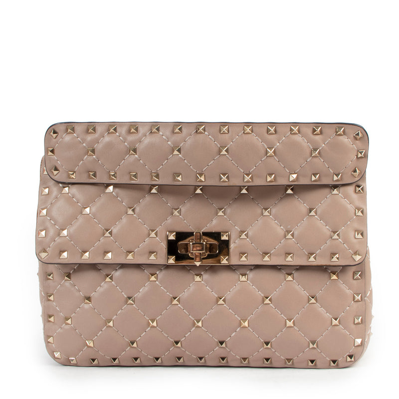 Valentino Garavani Beige Rockstud Spike Top Handle for the best price at Labellov secondhand luxury in Antwerp.