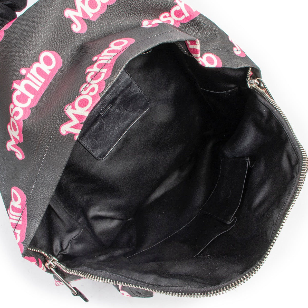 Shop safe online at Labellov in Antwerp this 100% authentic second hand Moschino Black Canvas Barbie Backpack