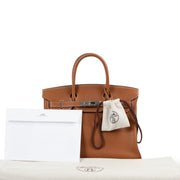 Buy an 100% authentic second hand Hermès Birkin 30 Gold Togo Palladium Hardware at Labellov