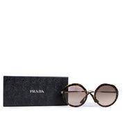 Shop safe online at Labellov in Antwerp, Brussels and Knokke these 100% authentic second hand Prada Tortoise Round Sunglasses