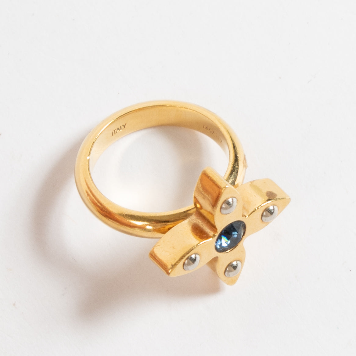 condition with minimal signs of wear. The gold-tone finish is luminous with only the slightest surface marks visible upon close inspection.