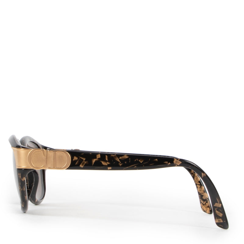 Get these Christian Dior Black Glasses with gold detail now at Labellov!