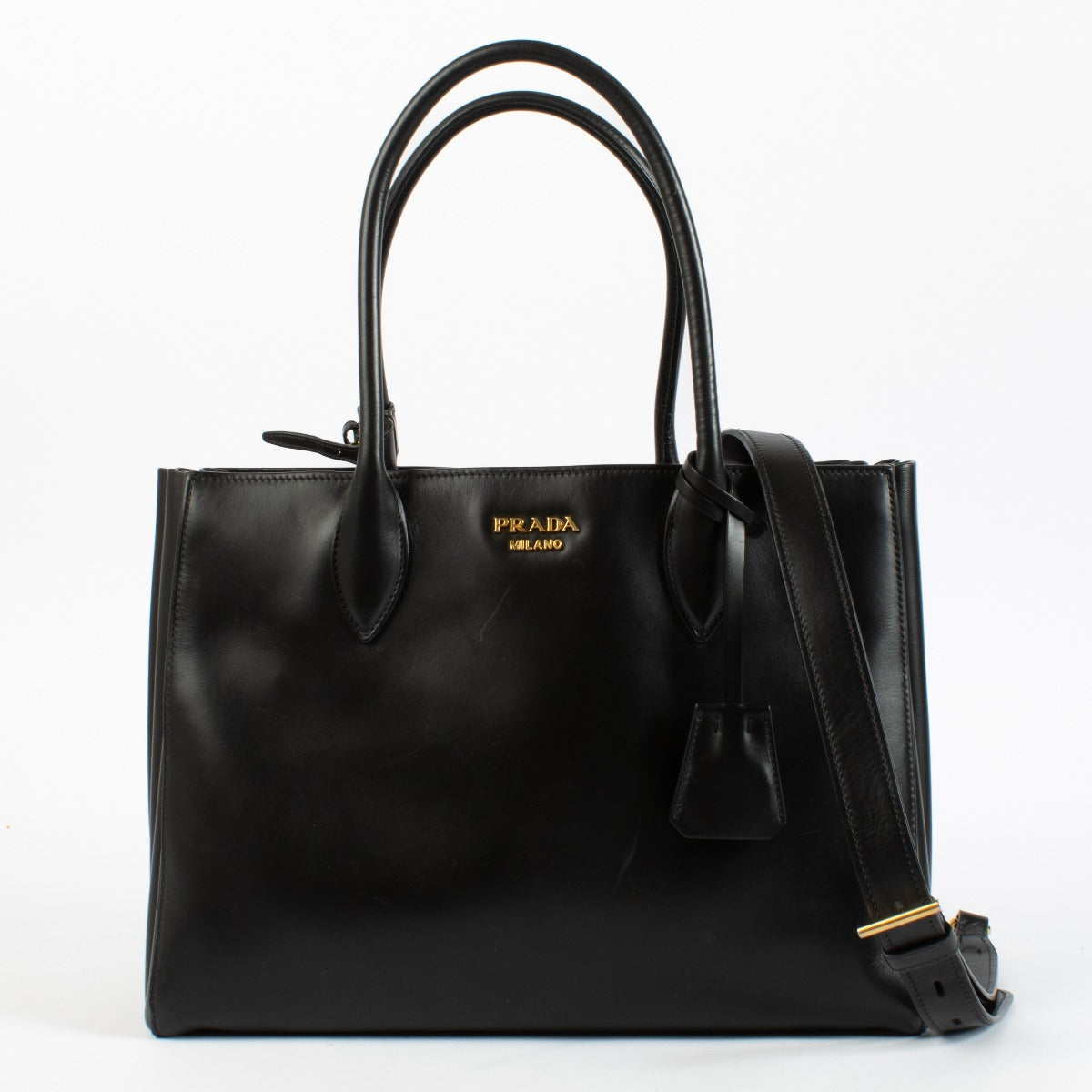 Authentic pre-loved Prada Medium Bibliothèque Tote in calfskin leather with structured silhouette at Labellov.com.