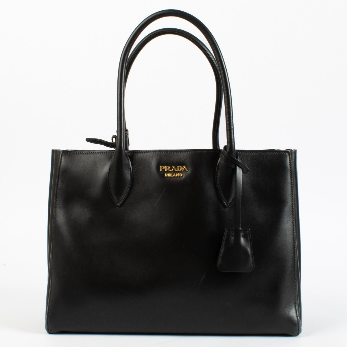 Authentic pre-loved Prada Medium Bibliothèque Tote in calfskin leather with structured silhouette at Labellov.com.