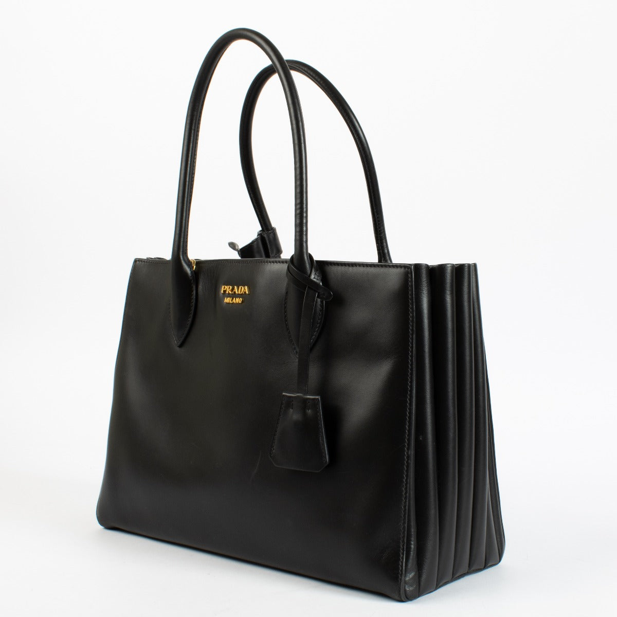Authentic pre-loved Prada Medium Bibliothèque Tote in calfskin leather with structured silhouette at Labellov.com.