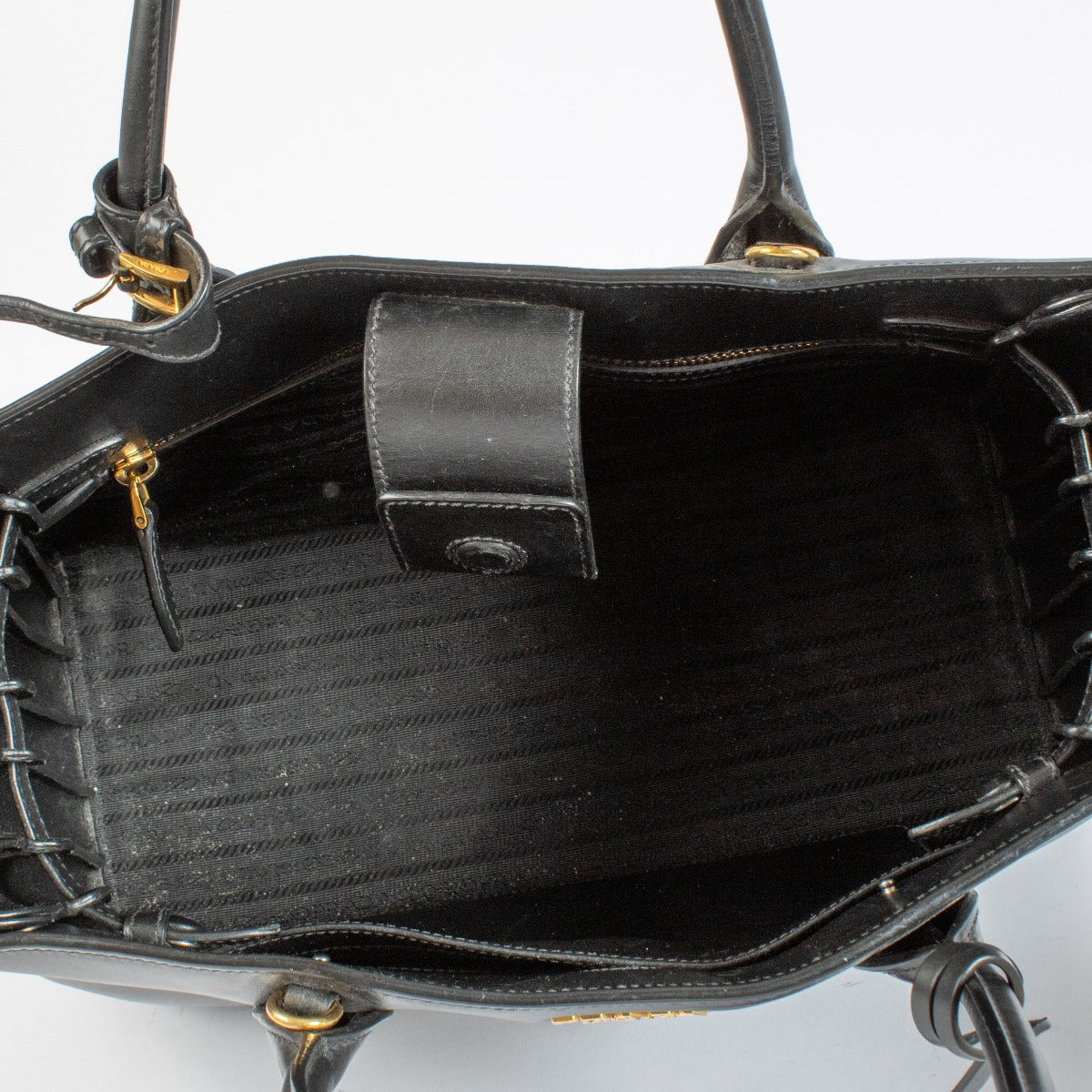 Authentic pre-loved Prada Medium Bibliothèque Tote in calfskin leather with structured silhouette at Labellov.com.