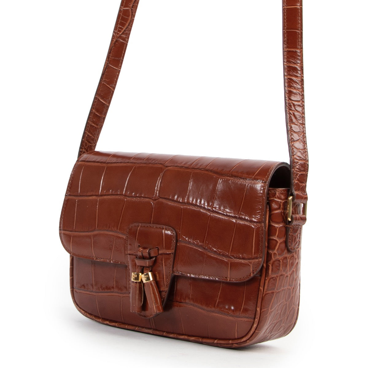 Shop safe online 100% authentic second hand Celine Brown Croco Stamp Tassel Bag Medium in very good condition at the right price at Labellov in Antwerp.
