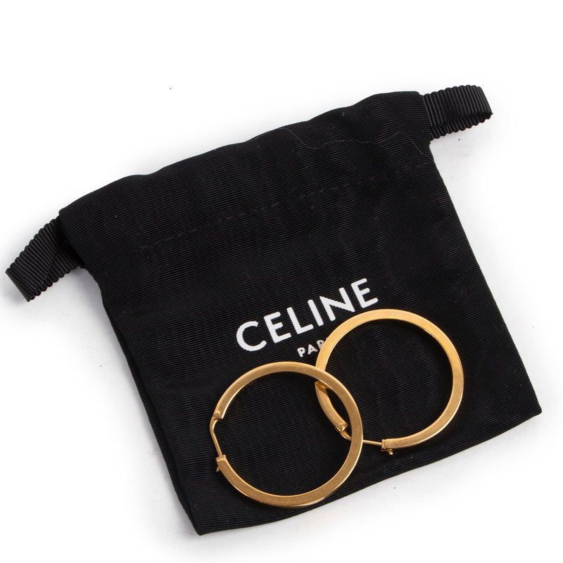 Shop safe online 100% authentic second hand Céline Gold Hoop Earrings in very good condition at the right price at Labellov in Antwerp.