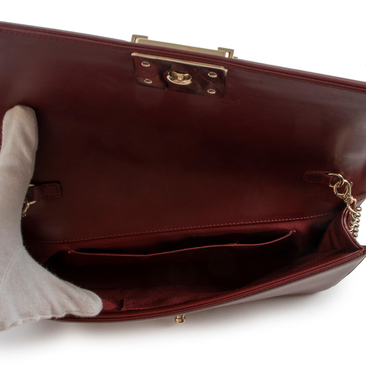 Pochette Boy Chanel en cuir de veau bordeaux