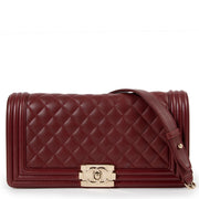Chanel Burgundy Leather East West Boy Bag for the best price at Labellov secondhand luxury in Antwerp