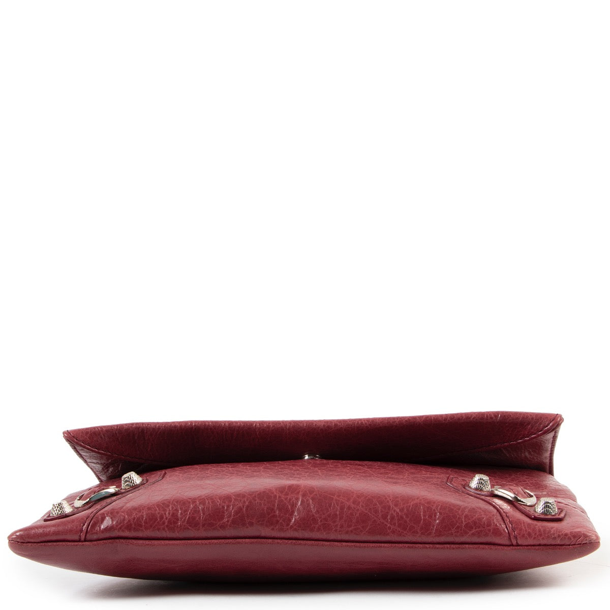 Shop safe online at Labellov in Antwerp this 100% authentic second hand Balenciaga Burgundy Agneau Leather Enveloppe Clutch