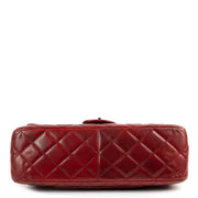 Authentic second hand designer Chanel Burgundy Reissue 2.55 Maxi Quilted Lambskin Flap Bag at labellov.com