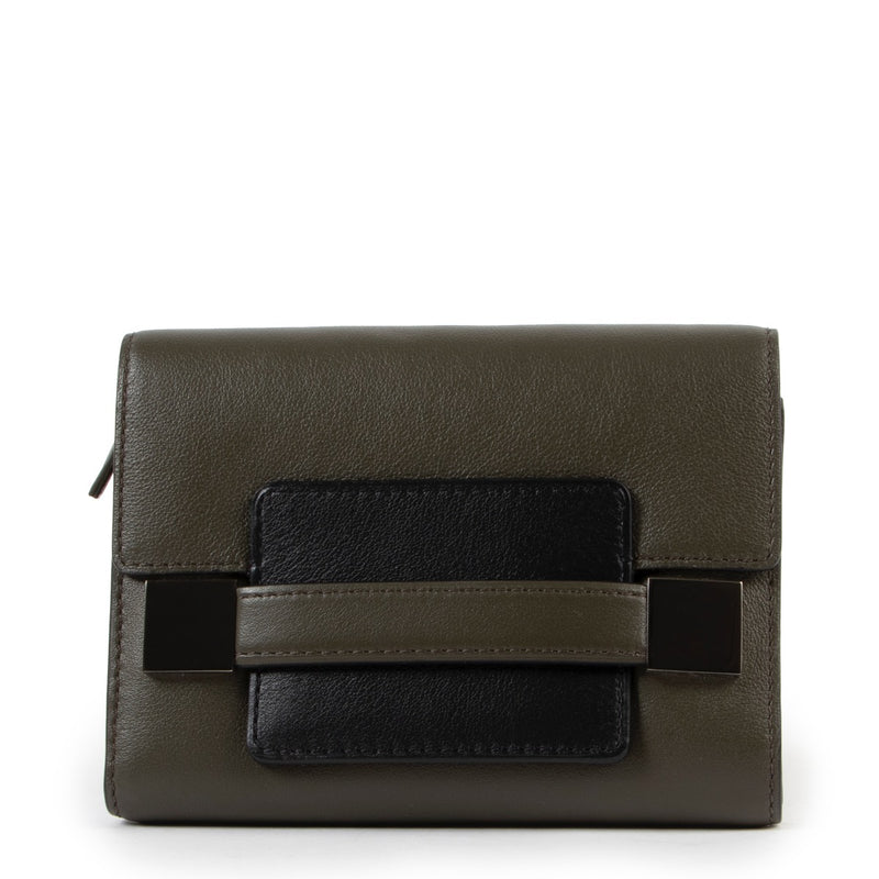 Shop and sell authentic second hand Delvaux Madame Bicolour Compact Wallet at Labellov for the best price