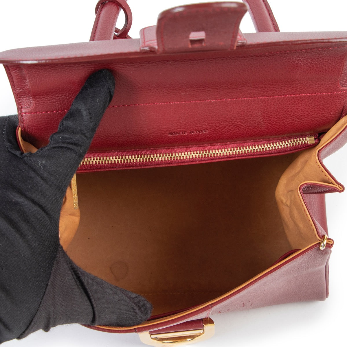 Buy an authentic second hand Delvaux Brilliant PM burgundy Top Handle at Labellov