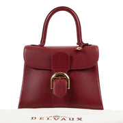 Buy an authentic second hand Delvaux Brilliant PM burgundy Top Handle at Labellov