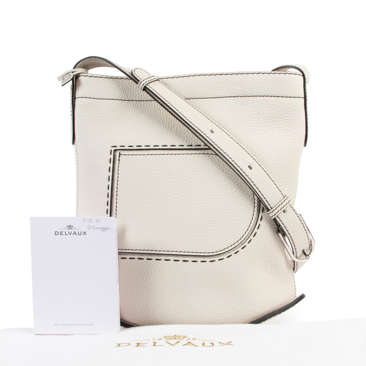 Buy an authentic second hand Delvaux Pin Daily Taurillon Soft Surpiqué in ivory at Labellov.
