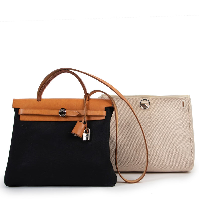 Buy an authentic second hand Hermès Herbag Zip Retourne 31 Ecru Beige and Black Top Handle in very good condition at Labellov