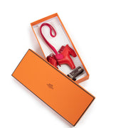 Shop safe online at Labellov in Antwerp this 100% authentic second hand Hermès Red Lambskin Rodeo Horse Bag Charm