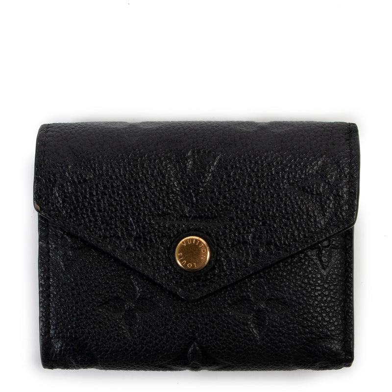 Shop safe online at Labellov in Antwerp this 100% authentic second hand Louis Vuitton Navy Monogram Empreinte Victorine Wallet