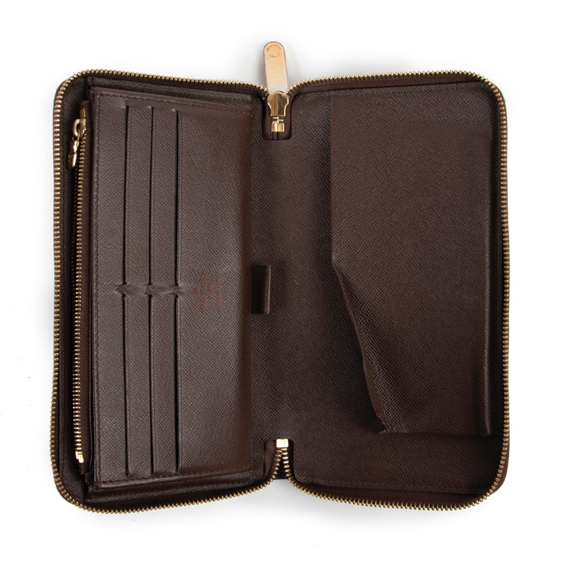 Buy a 100% authentic second hand Louis Vuitton Zippy Organizer Damier Ebene Wallet at Labellov