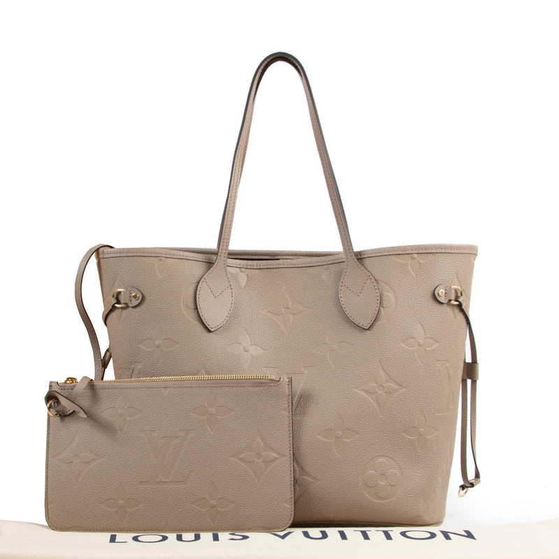 Shop safe online at Labellov in Antwerp this 100% authentic second hand Louis Vuitton Beige Monogram Empreinte Leather MM Neverfull