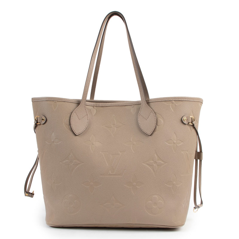 Shop safe online at Labellov in Antwerp this 100% authentic second hand Louis Vuitton Beige Monogram Empreinte Leather MM Neverfull