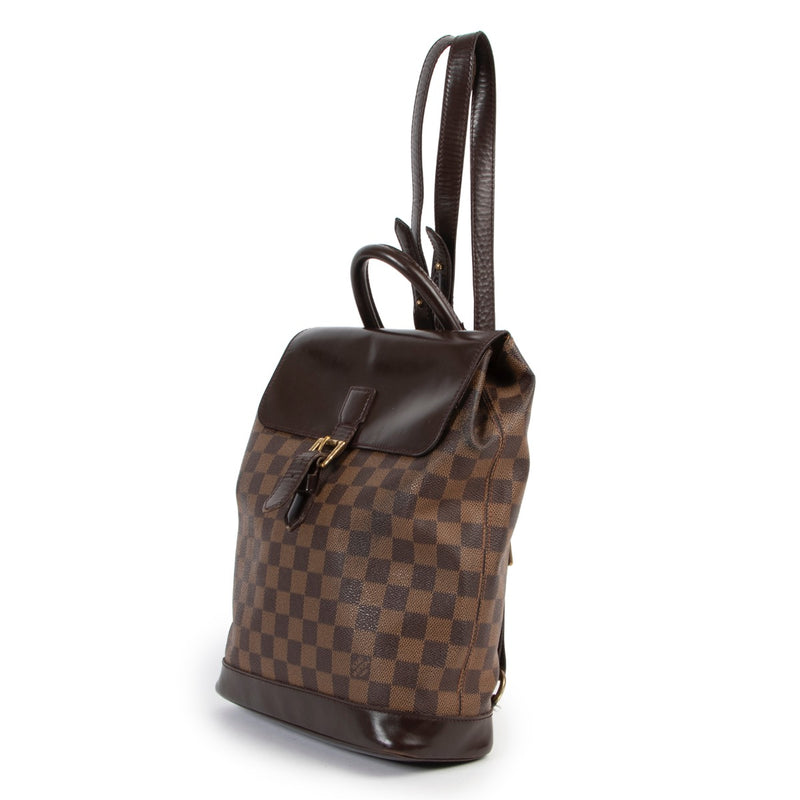 Shop safe online 100% authentic second hand Louis Vuitton Damier Ebene Canvas Soho Backpack at Labellov in Antwerp.