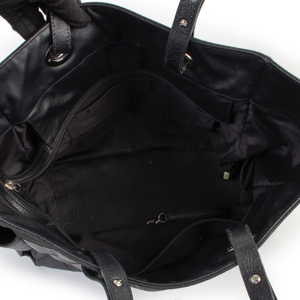 Shop safe online 100% authentic second hand Chanel Black Quilted Paris Biarritz Shopping Tote Bag in very good condition at Labellov in Antwerp.