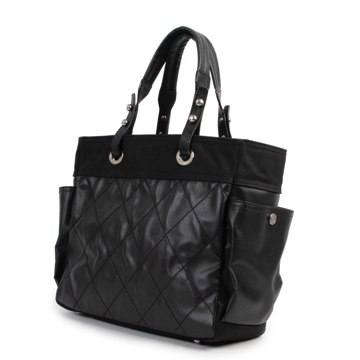 Shop safe online 100% authentic second hand Chanel Black Quilted Paris Biarritz Shopping Tote Bag in very good condition at Labellov in Antwerp.