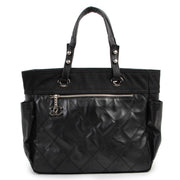 Shop safe online 100% authentic second hand Chanel Black Quilted Paris Biarritz Shopping Tote Bag in very good condition at Labellov in Antwerp.