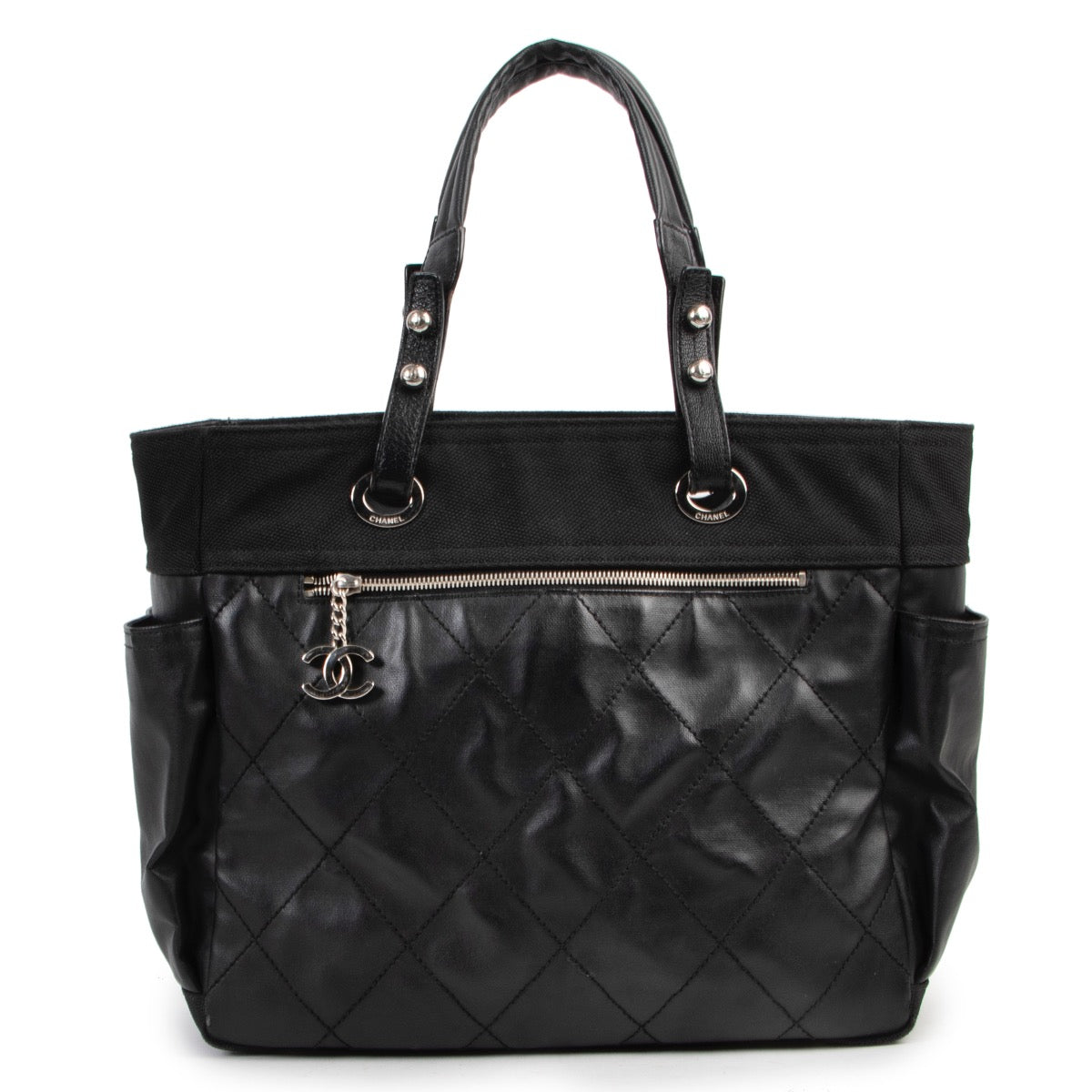 Shop safe online 100% authentic second hand Chanel Black Quilted Paris Biarritz Shopping Tote Bag in very good condition at Labellov in Antwerp.