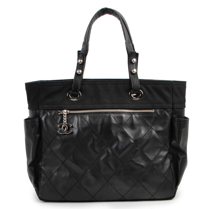 Shop safe online 100% authentic second hand Chanel Black Quilted Paris Biarritz Shopping Tote Bag in very good condition at Labellov in Antwerp.