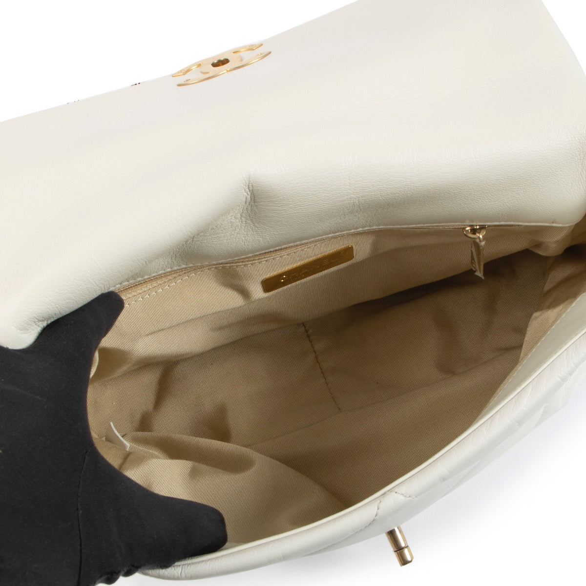 Chanel White 19 Large Crossbody Bag for the best price. Buy and sell your designer bags and accessories for the best price.