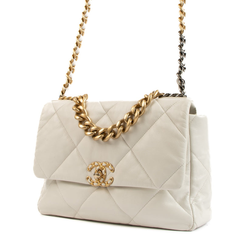 Chanel White 19 Large Crossbody Bag for the best price. Buy and sell your designer bags and accessories for the best price.