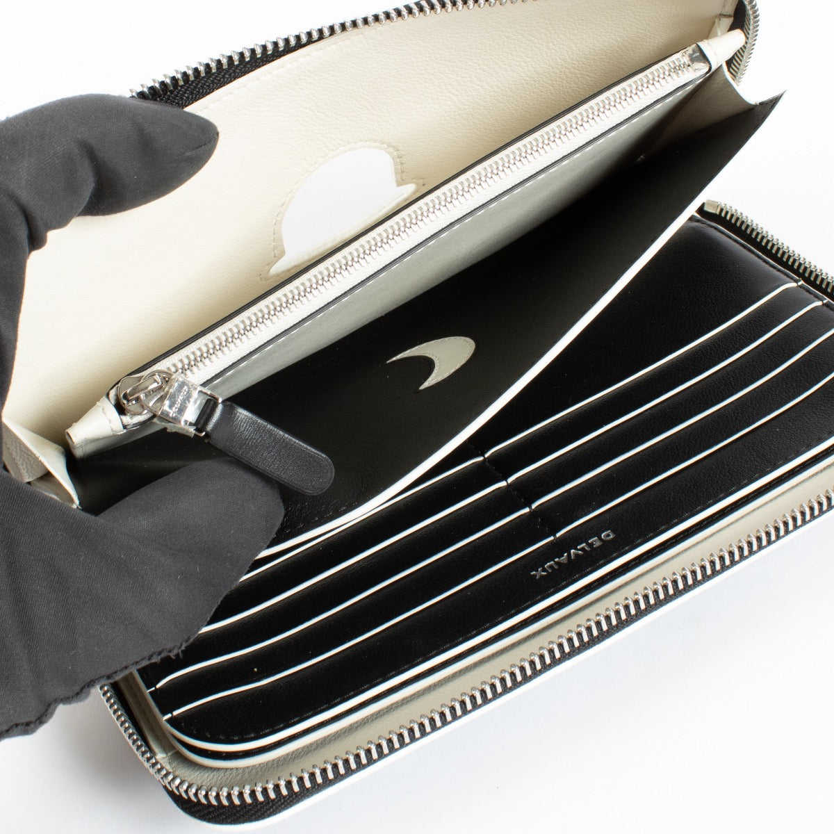 Shop 100% authentic second hand Delvaux Trompe L'oeil La Corde Wallet on Labellov.com