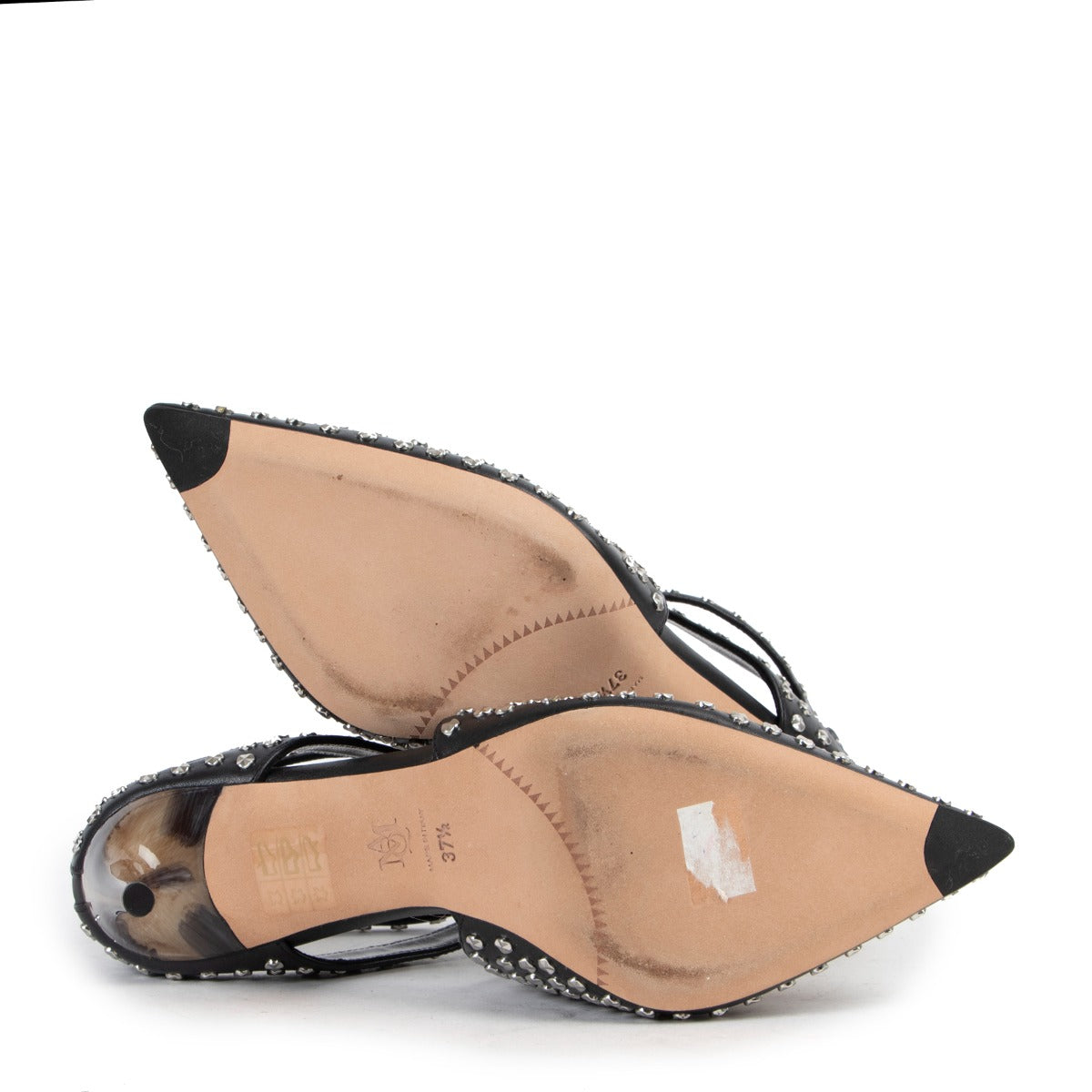 Buy these Alexander McQueen Studded Black Horn Heels - Size 37,5 at Labellov in very good condition and give them a second life. Buy, sell, love and repeat.