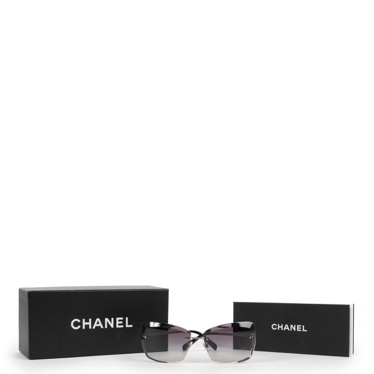 Shop safe online 100% authentic second hand these 100% authentic second hand Chanel Black Rimless Sunglasses