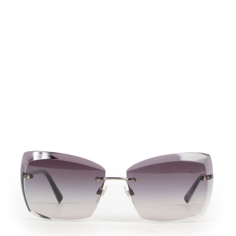 Shop safe online 100% authentic second hand these 100% authentic second hand Chanel Black Rimless Sunglasses