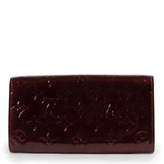 Shop safe online at Labellov in Antwerp this 100% authentic second hand Louis Vuitton Purple Vernis Sarah Wallet