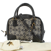Buy authentic second hand Loewe Black Canvas & Leather Anagram Amazona 19 Top Handle Bag at Labellov.com