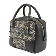 Buy authentic second hand Loewe Black Canvas & Leather Anagram Amazona 19 Top Handle Bag at Labellov.com