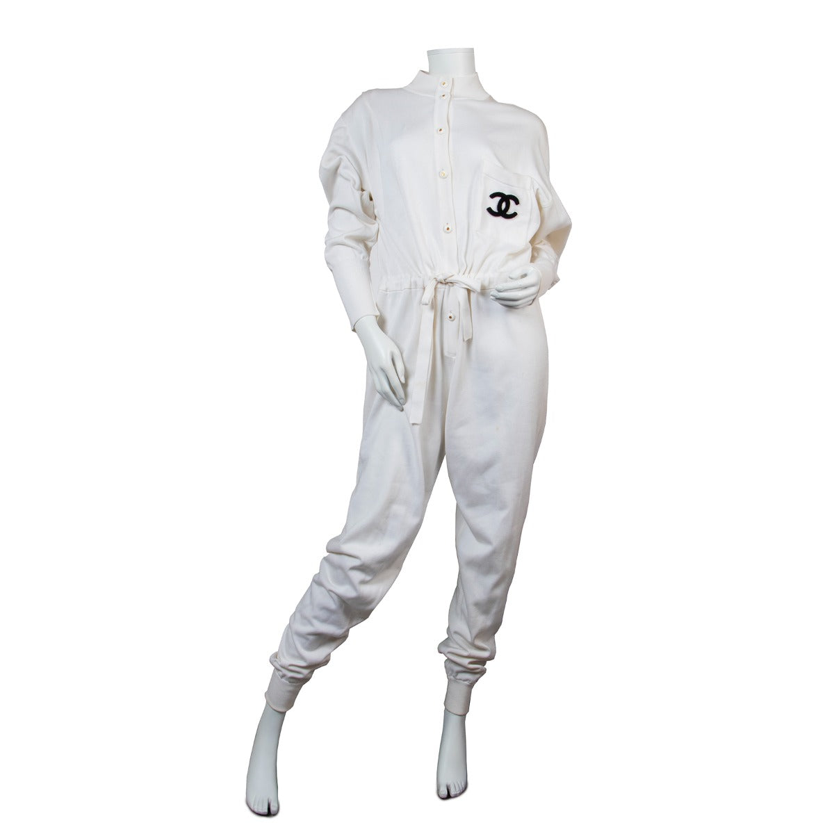 Buy an authentic second hand Chanel Iconic White Knit Logo Jumpsuit Ca. 1991 Size 42 in good condition at Labellov