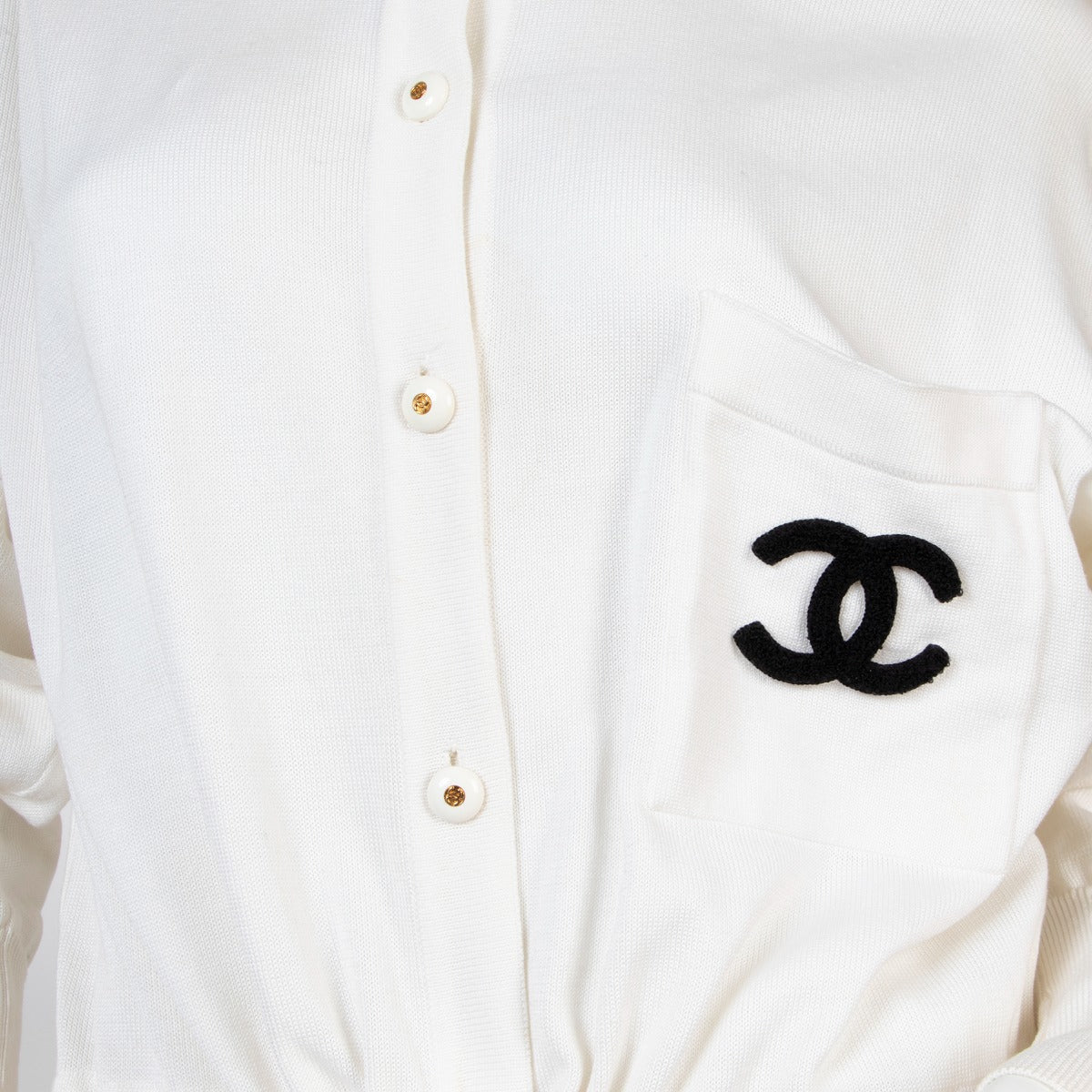 Buy an authentic second hand Chanel Iconic White Knit Logo Jumpsuit Ca. 1991 Size 42 in good condition at Labellov
