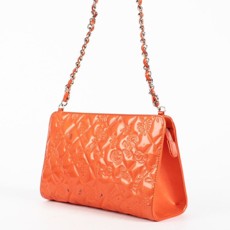 Authentic pre-loved Chanel Orange Patent Precious Symbols Bag on Labellov.com