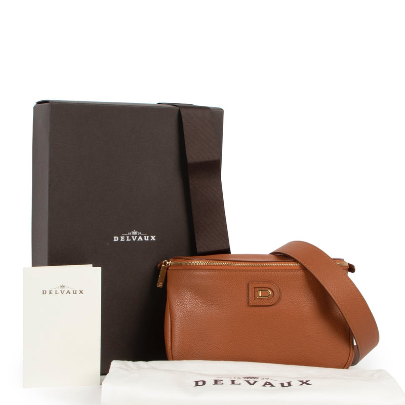 Shop safe online at Labellov in Antwerp this 100% authentic second hand Delvaux Cognac Belt Bag