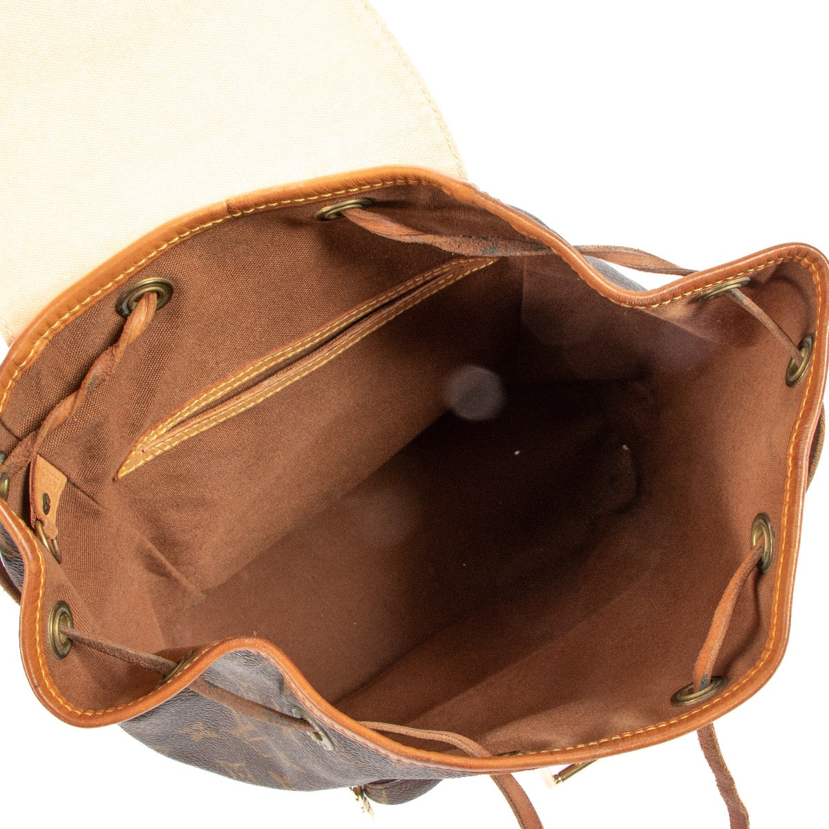 Shop safe online at Labellov in Antwerp, Brussels or Knokke this 100% authentic second hand Louis Vuitton Monogram Montsouris Backpack