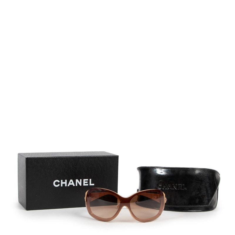 Chanel Beige Sunglasses now available. Shop online 24/7 or get them in our showroom. Consign your designer items at Labellov Luxury