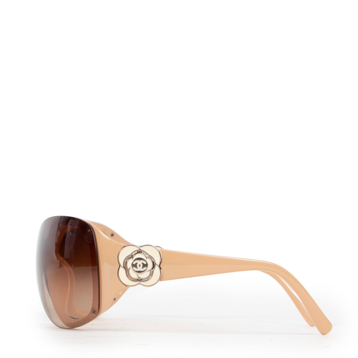 Chanel Beige Sunglasses now available. Shop online 24/7 or get them in our showroom. Consign your designer items at Labellov Luxury