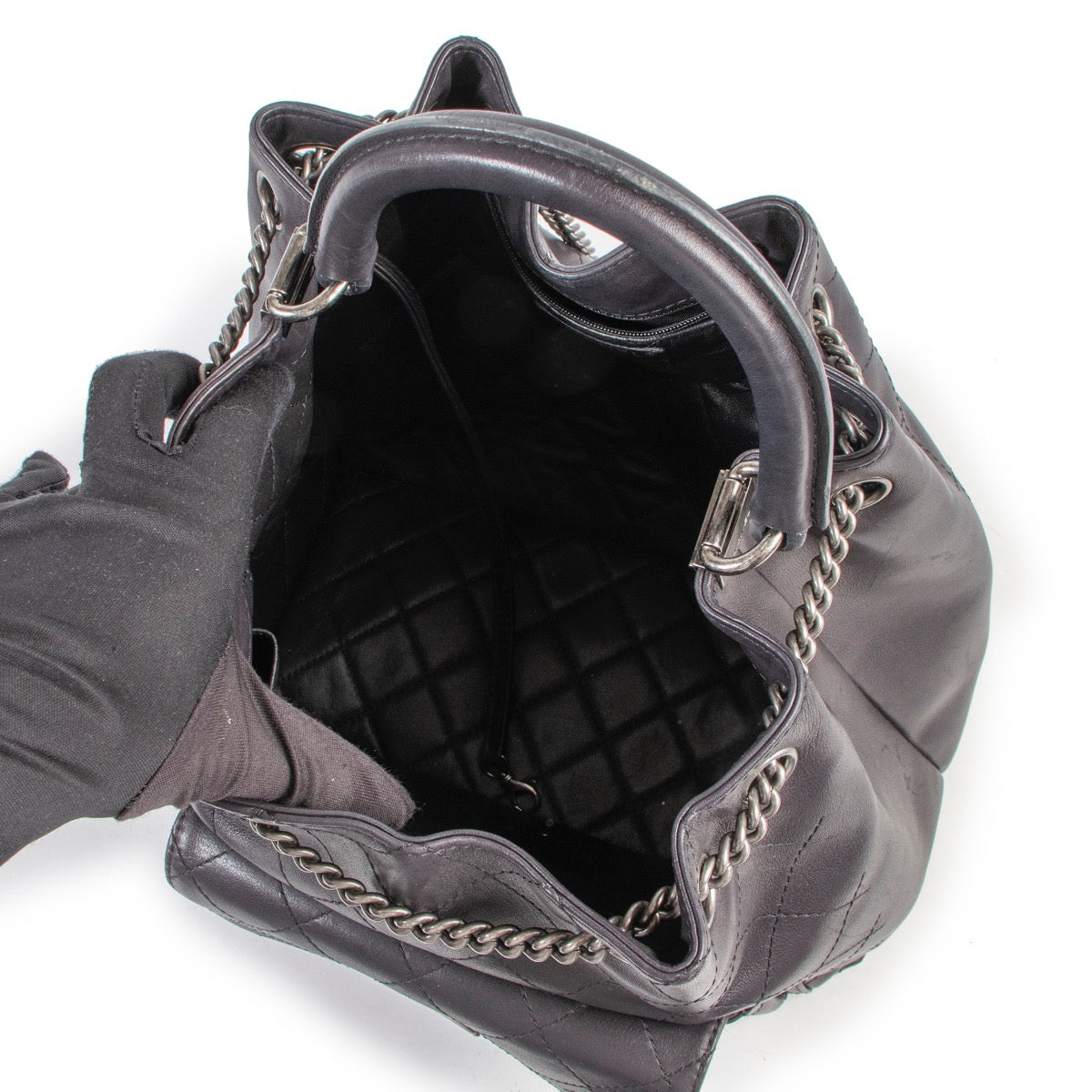 Shop safe online at Labellov in Antwerp this 100% authentic second hand Chanel Black Stitched Leather Urban Luxury Drawstring Backpack in as new condition.